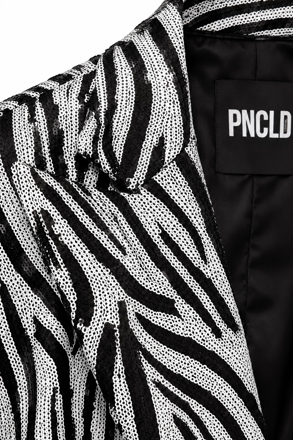 Asymmetrische Zebra-Paillettenjacke